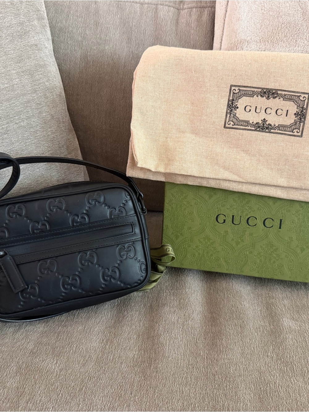 Gucci Black GG Embossed Leather Crossbody Bag